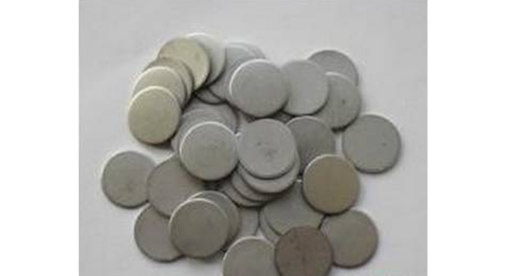 Coin cell spacer